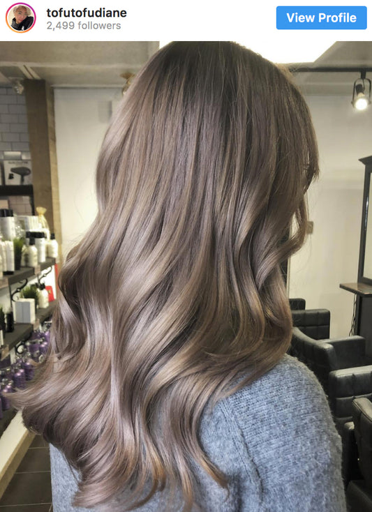 Girl with mushroom dark ashy blonde 