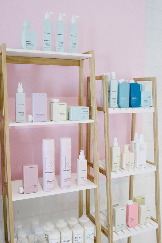 Shelves stocked with Evo hair care products at Viva La Blonde salon